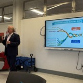 Marvin Jeter speaks beside a screen showing a diagram labeled “Leadership’s Braided Rope.”