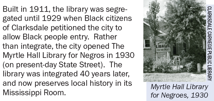 Historical panel describing segregation-era library services in Clarksdale alongside a 1930 photo of the Myrtle Hall Library for Negroes.