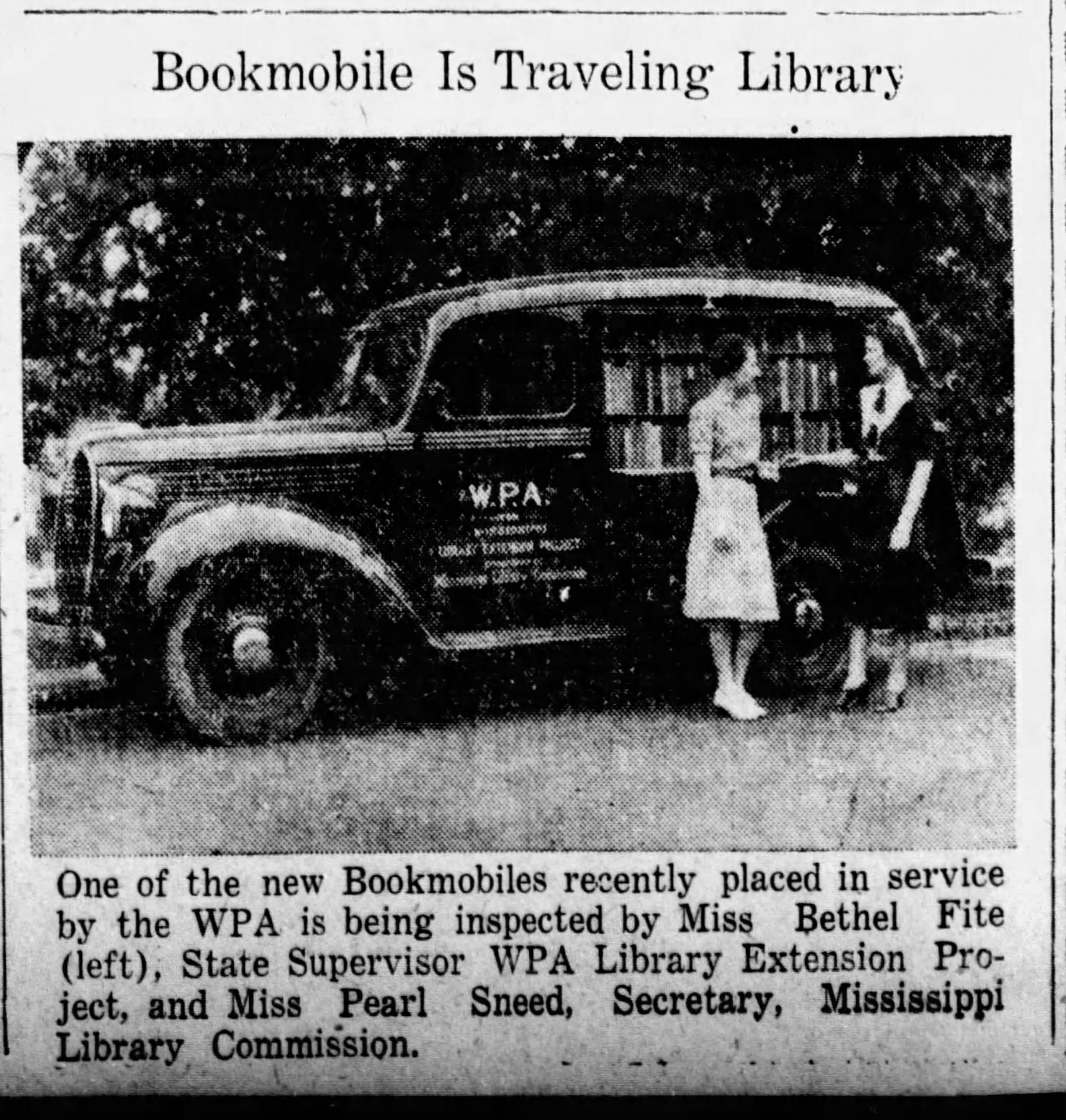 Black and white newspaper clipping titled "Bookmobile Is Traveling Library" showing a WPA bookmobile truck with people browsing books.